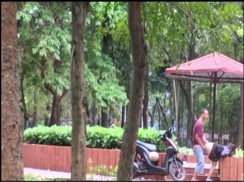 Couple playing together at Linh Dam lake
